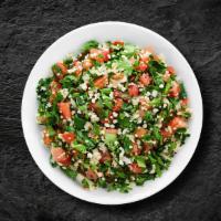 Tabbouleh Feast Salad · Made with Chopped parsley, tomatoes, onion, mint with burgul, lemon juice and olive oil