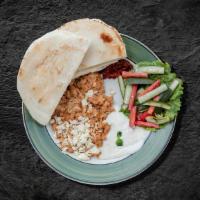 Classic Chicken Combo Dinner · chicken marinated, vertically grilled, thinly sliced, served with house rice, hummus and salad