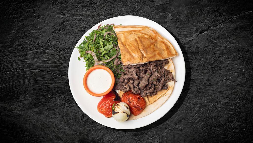Big B Shawarma Dinner · Beef marinated, vertically grilled, thinly sliced, served with house rice, hummus and salad