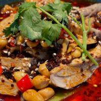Steamed Chicken In Chili Oil · poached and mixed with chili oil and peppercorn sauce and peanuts
