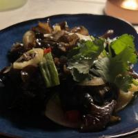 Wood Ear Mushroom Salad · poached and mixed with chili and lemon sauce