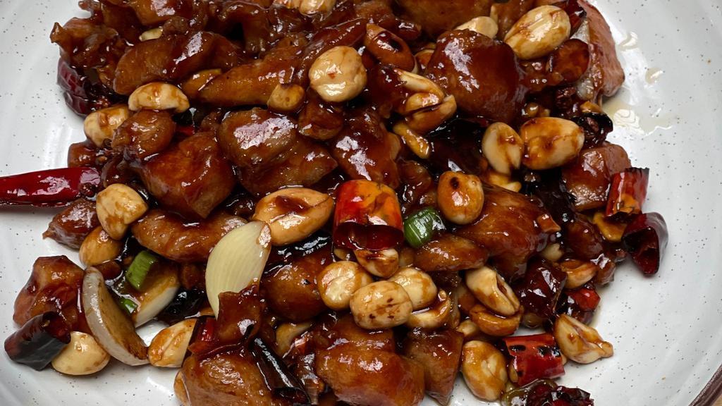 Kung Pao Chicken  · sauteed diced chicken with peppercorn and chilies with house-made sauce, lightly spicy