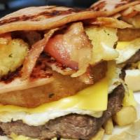 Jersey Big Boy Burger · Porkroll, Egg Overeasy, Cheeseburger, bacon, onion rings, mozzarella sticks, french fries, b...