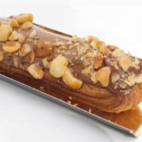 Eclair  Nutella · Nutella pastry cream and glaze, topped with hazelnuts.