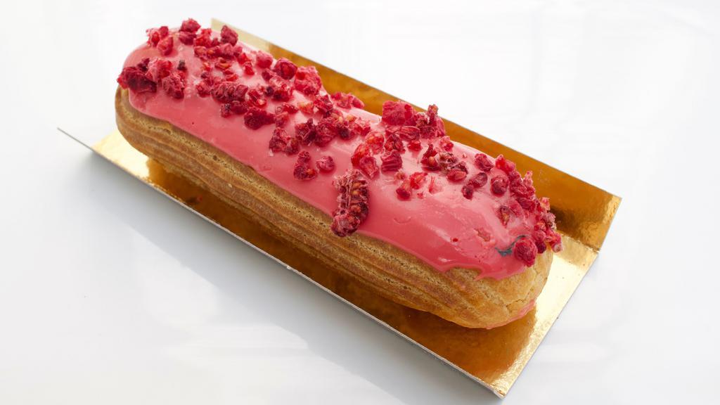 Eclair Raspberry · Raspberry pastry cream and glaze, with dried raspberry pieces.