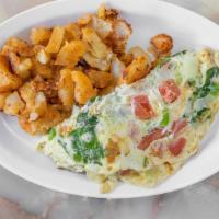 Egg White Omelette With Veggies · Served with home fries or grits and toast.