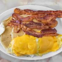 Pancakes Deluxe · Most popular. Bacon, eggs, cheese.