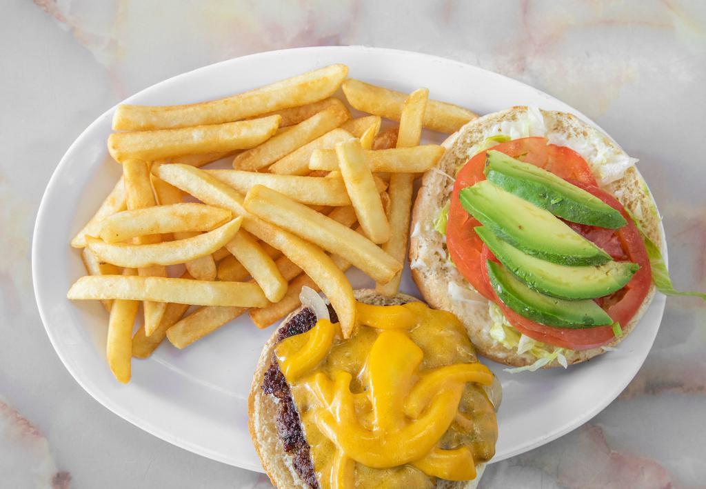 Avocado Cheddar Deluxe · With jalapeno peppers, lettuce, tomatoes, pickles and a side.