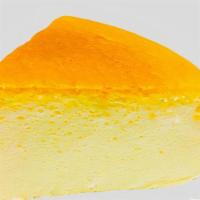 Soufflé Cheesecake · Melt-in-your-mouth combination of Cheesecake and Cotton-soft Soufflé. 
Contains dairy, glute...