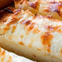 Cheesy Garlic Bread · Baked till golden brown and topped with garlic & cheese with your choice of dipping sauce.