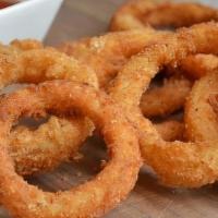 Onion Rings (12 Pieces) · Battered and fried till crispy golden brown (12pcs).