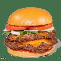 Double Cheeseburger · Contains: Cheddar, Ketchup, Onions, Tomato, Green Leaf Lettuce, Brioche Bun, Hamburger