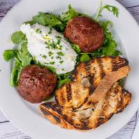 Meatballs · Fried veal meatballs stuffed with fontina served with a side of ricotta cheese and toasted c...