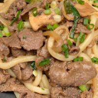 Bulgogi Noodles · Udon noodles sauteed with marinated rib-eye beef and vegetables