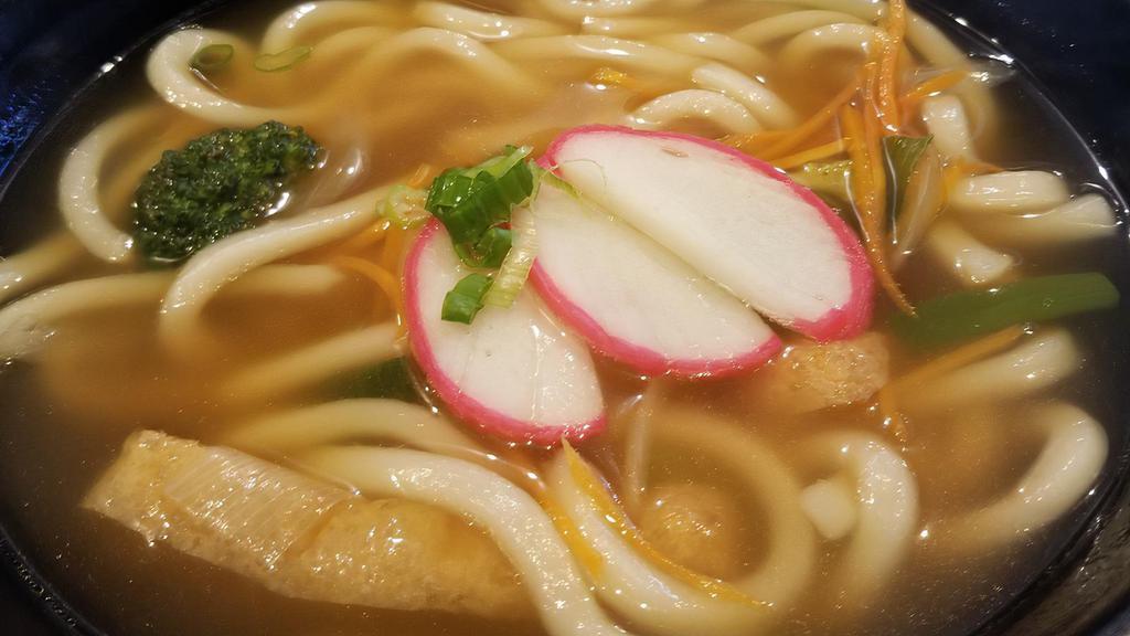 Udon Soup · Udon noodles with vegetables and fish cakes in our signature broth