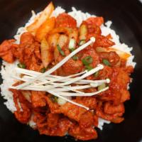Sweet & Spicy Pork Rice Bowl · Steamed white rice topped with marinated sweet & spicy pork and vegetables. Served with miso...
