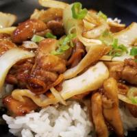 Sauteed Chicken Over Rice · Steamed white rice topped with marinated chicken and vegetables. Choose either Teriyaki or M...