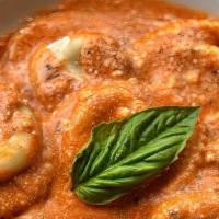 Fresh Ricotta Ravioli · Fresh ricotta ravioli, fresh mozzarella, creamy pomodoro sauce