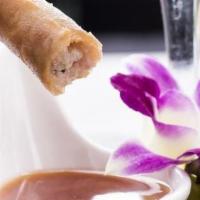 Crispy Taro Rolls · Popular. Fried spring rolls stuffed with succulent prawns and sweet taro, served with Noi st...