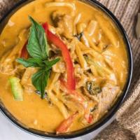 Bangkok Red Curry · Popular, spicy. A timeless Thai classic, this rich curry features red chili paste simmered w...