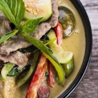 Classic Green Curry · Made with green chilies, our green curry emphasizes Kaffir lime peel and palm sugar. Simmere...