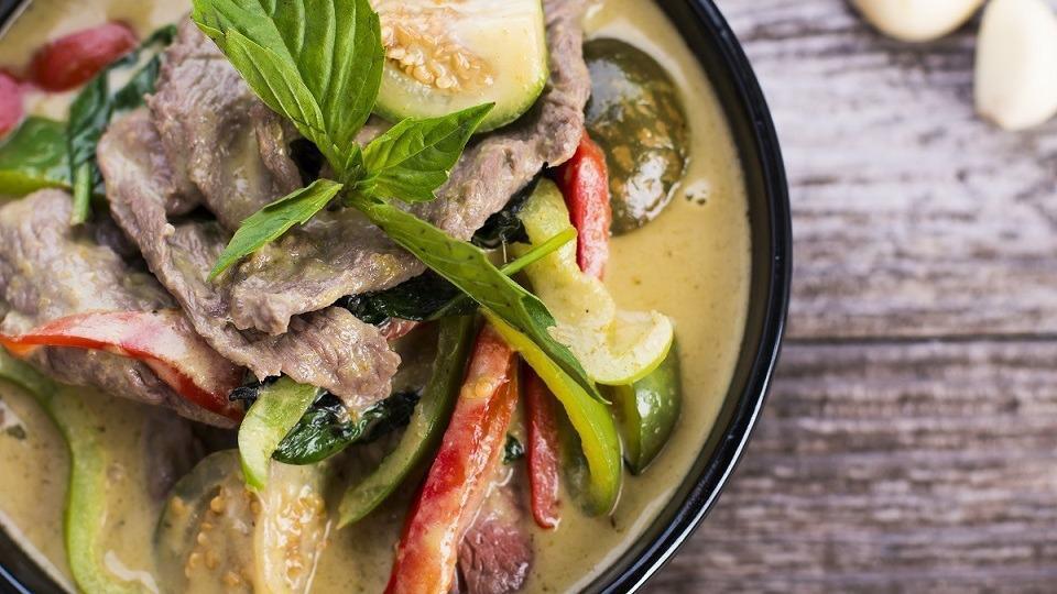 Classic Green Curry · Made with green chilies, our green curry emphasizes Kaffir lime peel and palm sugar. Simmered in coconut milk with bamboo shoots, basil, bell peppers and your choice of meat.