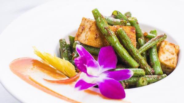 Spicy Green Beans · Spicy. Stir fried crisp green beans in a savory sauce of garlic and chili paste with choice of protein.