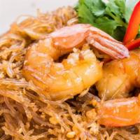 Clay Pot Shrimp & Glass Noodles · A century old Thai favorite dish includes shrimp, bacon, stir fried glass noodles, garlic, g...