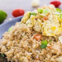 Crab Fried Rice · A generous portion of succulent crab meat stir fried with jasmine rice, eggs, onions, and to...