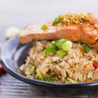 Salmon Garlic Fried Rice · Spicy. Jasmine rice stir fried in flavorful garlic paste, red bell pepper, carrot, and green...
