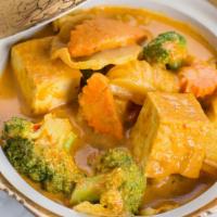 Yellow Curry · Slightly milder than red and green curry, our yellow curry is cooked with coconut milk, carr...
