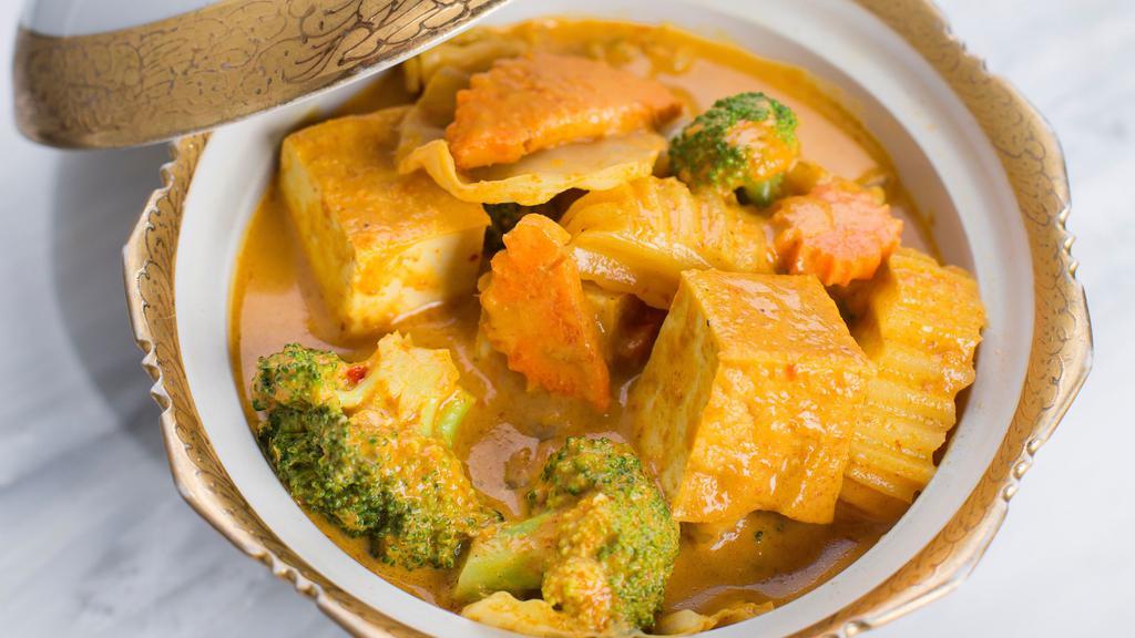 Yellow Curry · Slightly milder than red and green curry, our yellow curry is cooked with coconut milk, carrots, cabbage, potato, broccoli, onion, and fried tofu.
