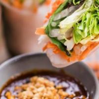 Fresh Rolls · Stuffed with shrimp, BBQ pork, cilantro, bean sprouts, carrots, lettuce, basil leaves, and r...