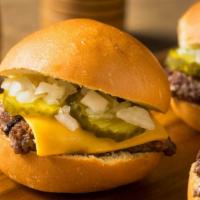 Beef & Cheese Slider · Delicious Beef Slider topped with fried onions and melted cheese.