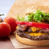 Cheesy Double Beef Slider · Delicious Double Beef Slider topped with fried onions and a double portion of melted cheese.