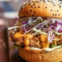 Hot Chicken Slider With Cheese · Delicious spicy Chicken Slider topped with fried onions and melted cheese.