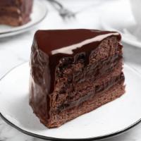 Chocolate Cake · Moist Chocolate cake, topped with chocolate frosting.