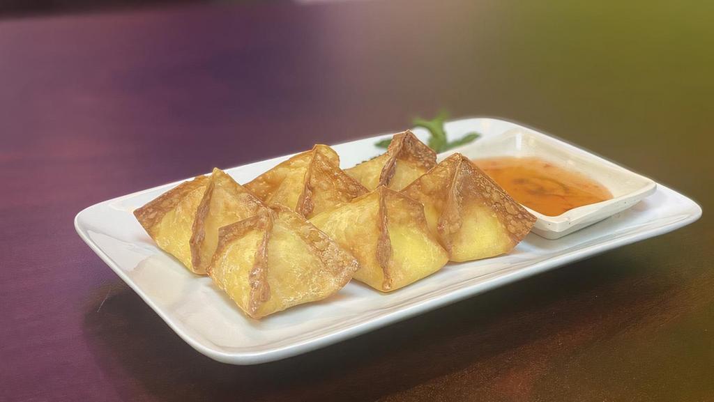 Crab Rangoon · Stuffed with imitation crab meat in wonton skin with cream cheese. Diced onions, carrots served with plum sauce.