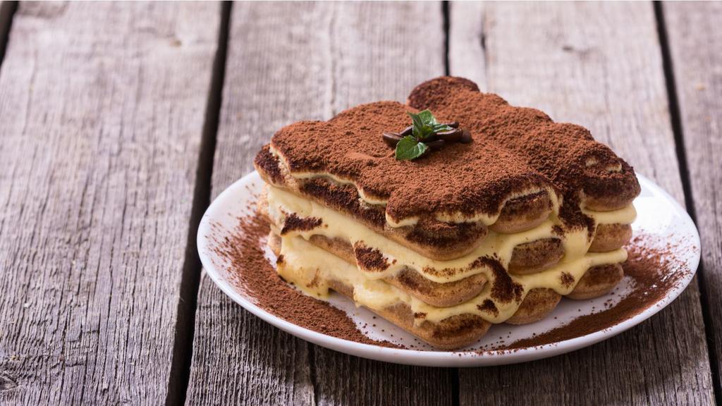 Tiramisu · Ladyfingers dipped in coffee, layered with a whipped mascarpone cheese mixture and a hint of cocoa.