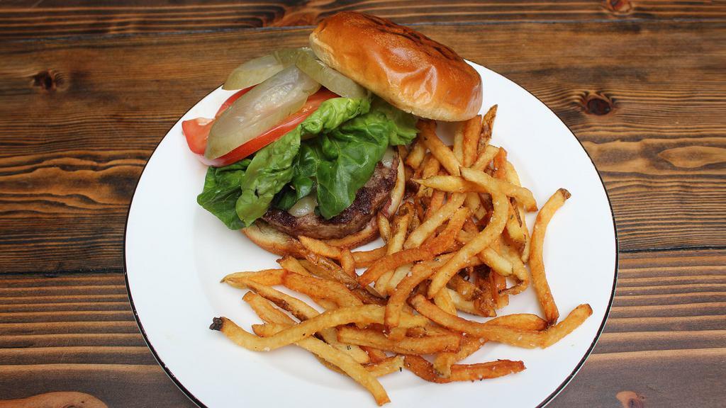 Grass-Fed Beef Burger With Pommes Frites · Grass-fed beef burger, gem lettuce, tomato, red onion, pickles, jalapeño aioli, brioche bun, rosemary pommes frites.