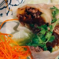 Duck Roll · Roti parata wrapped with duck meat (Scallion,Cucumber,Calendar) x special sauce