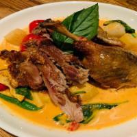 Duck Red Curry -Gf · Gluten free ํ 
Spicy. String bean, pineapple, tomato, bamboo shoot, basil and bell pepper. S...