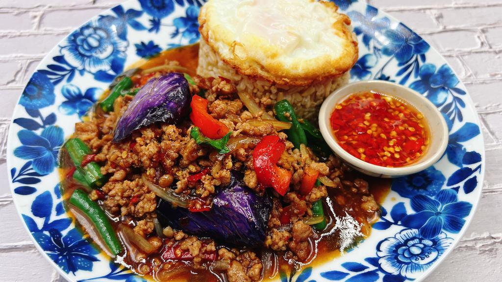 C08=Ka Pao Moo · Minced pork basil sauce with eggplant and fried egg over rice. 
Priknampla= Fresh Chili in Fish sauce.