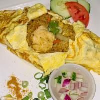 Fr06=Yellow Curry Fried Rice Chicken · Wrapped in egg served with CURRY Puff sauce!! Yum.