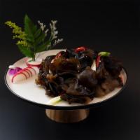 Woodear Mushroom Salad 剁椒云耳 · Black agaric, diced red pepper and black vinegar.