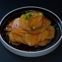 Mala Spicy Potato麻辣土豆片 · Thinly sliced potatoes dry rubbed, spicy chili sauce.
