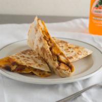 Quesadilla Americana · Flour tortilla, meat of choice, cheese.