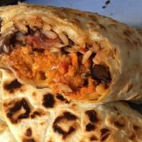 Burrito Begetariano · cheddar cheese & mozzarellas  black beans peppers onion  rice & lettuce n