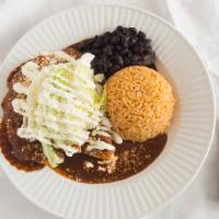 Enchiladas · Tinga chicken or tinga steak with choice of tomatillo, green mole or red mole sauce.