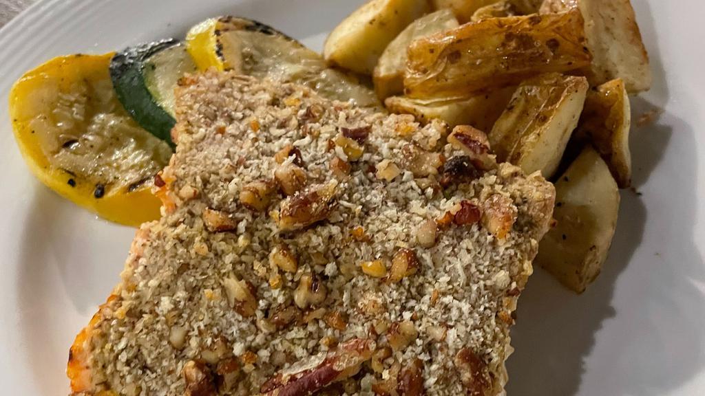 Salmon, Pecan Crusted · Seasoned and seared to perfection. Prepared medium rare to allow for reheating to your preferred temperature.